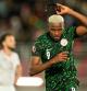 Nigeria's Victor Osimhen reacts after scoring his side's first goal during the Africa Cup of Nations group C soccer match between Nigeria and Tunisia in Fez, Morocco, Saturday, Dec. 27, 2025. (AP Photo/Mosa'ab Elshamy)